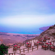 six senses zighy bay thumbnail dining on the terrace