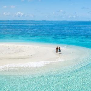 Luxury Maldives Holiday Packages Baglioni Maldives Resorts Couple In Sand Bank