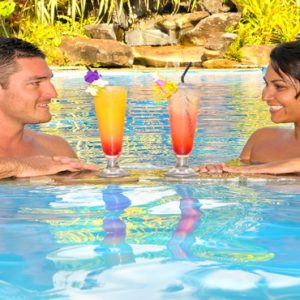 Couple In Pool Crown Beach & Spa Resort Rarotonga Cook Island Honeymoons