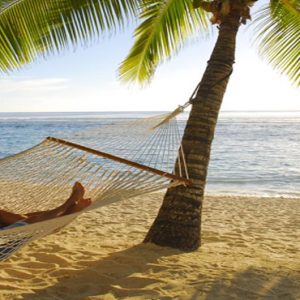 Couple On Hammock Crown Beach & Spa Resort Rarotonga Cook Island Holidays