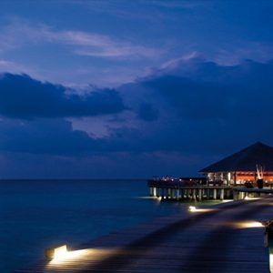 Coco Bodu Hithi Luxury Maldives Honeymoon Packages Stars Restaurant Exterior At Night