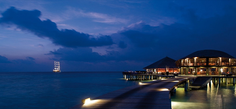 Coco Bodu Hithi Luxury Maldives Honeymoon Packages Stars Restaurant Exterior At Night