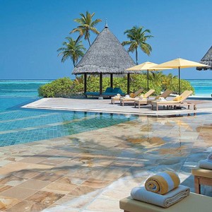 Four Seasons Maldives - Maldives Honeymoon Packages - pool loungers