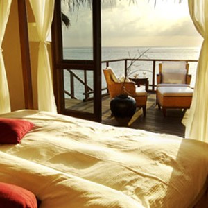 Kandolhu Island - water villa bedroom