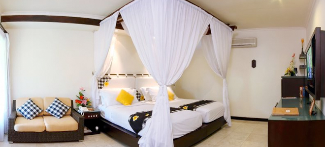 Legian-Beach-Bali-Deluxe-Garden-or-Beach-Rooms-Bed