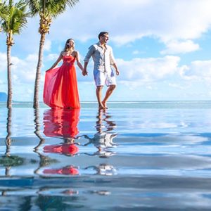 Luxury Mauritius Holiday Packages Maradiva Villas Resort & Spa Couple By Infinity Pool