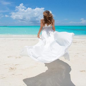 Luxury Mauritius Holiday Packages Shanti Maurice Resort & Spa Women On Beach