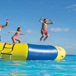 Luxury Mexico Holiday Packages Dreams Sands Cancun Resort And Spa Kids On Trampoline