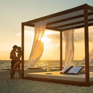 Luxury Mexico Holiday Packages Secrets Playa Mujeres Couple By Bali Beach Bed