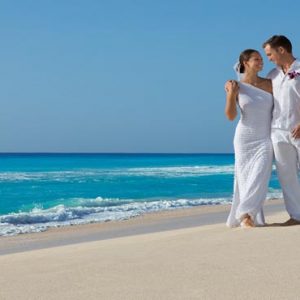 Luxury Mexico Holiday Packages Secrets The Vine Cancun Bride And Groom On Beach