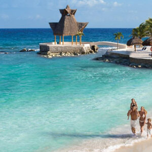 Luxury Mexico Holiday Packages Dreams Aventuras Riviera Maya Family Walking On Beach