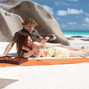 Luxury Seychelle Holiday Packages Constance Lemuria Honeymoon Couple On Beach