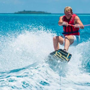 Maldives Holidays Banyan Tree Vabbinfaru Boat Surfing