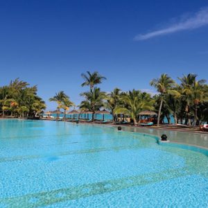 luxury Mauritius holiday Packages Dinarobin Beachcomber Golf Resort & Spa Main Pool With Views Towards The Indian Ocean