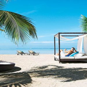 Mauritus holiday Packages Heritage Awali Golf & Spa Resort Relaxing On The Beach Cabana