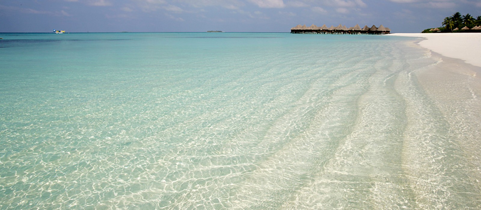 PD Header Luxury - Holidays - Maldives - Coco Palm, Dhuni Kolhu - Aerial View