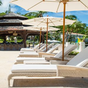 Sun Loungers And Beach Blue Waters Antigua Antigua Holidays
