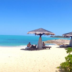 Thailand Honeymoon Packages The Tongsai Bay, Koh Samui Relaxing On Beach