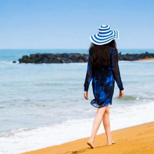 Woman Strolling On Beach The Fortress Resort & Spa Sri Lanka Holidays