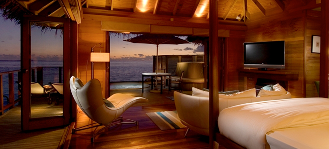 conrad maldives - deluxe water villa bedroom
