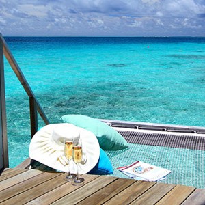 centara ras fushi - maldives honeymoon packages - premium deluxe spa water villa
