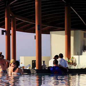 centara ras fushi - maldives honeymoon packages - waves pool bar