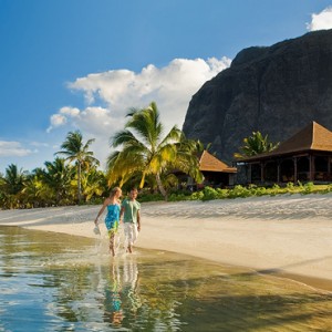 couple on the beach - lux le morne mauritius - luxury mauritius holiday packages