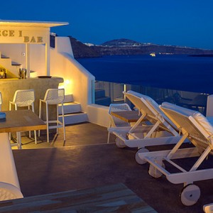 loungers - la perla villas santorini - luxury santorini holiday packages