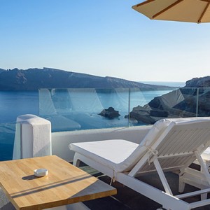 loungers - la perla villas santorini - luxury santorini holiday packages