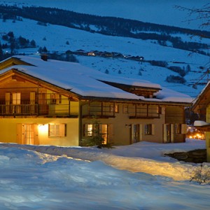 Pragelato Vialetta - Luxury Italy Holiday Packages - hotel at night in snow