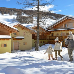 Pragelato Vialetta - Luxury Italy Holiday Packages - hotel exterior in the snow