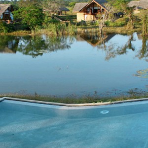 Jetwing Vil Uyana - Luxury Sri Lanka Holiday Packages - Pool and lake