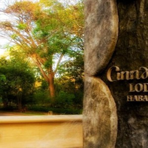 Cinnamon Lodge Habarana - Luxury Sri Lanka Holiday Package - Hotel logo on tree