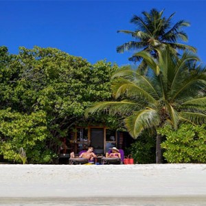 luxury maldives holiday packages - komandoo island - beach villa