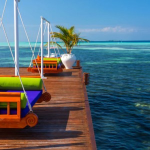 Luxury Maldives Holiday Packages Olhuveli Beach And Spa Resort Maldives Swinging Chairs