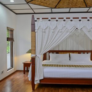 Bandos Maldives Luxury Maldives holiday Packages Deluxe Room Bedroom