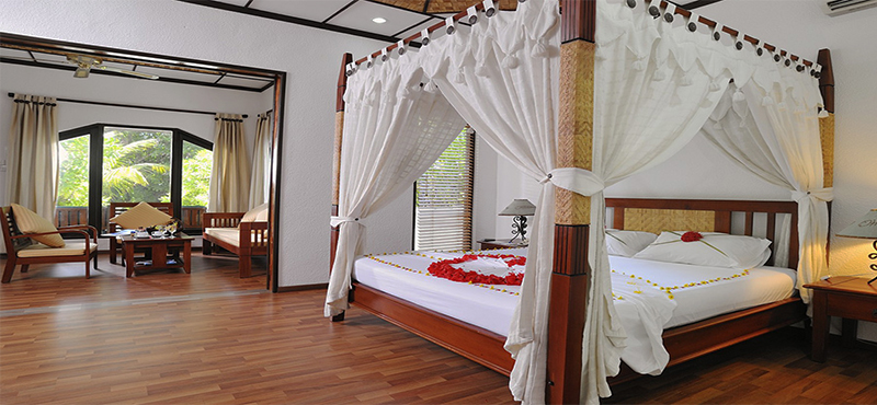 Bandos Maldives Luxury Maldives holiday Packages Deluxe Room Bedroom1