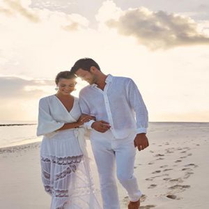 luxury Maldives holiday Package Joali Maldives Couple On Beach