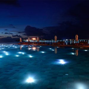 luxury Maldives holiday Package Joali Maldives Pool At Night