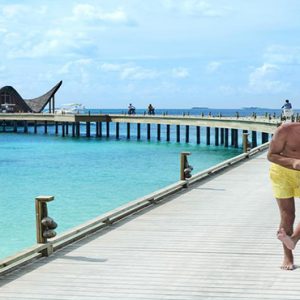 luxury Maldives holiday Package Joali Maldives Bike Riding On Jetty