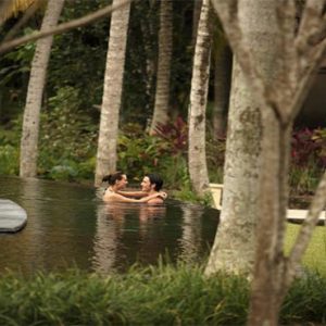 The Ubud Village Resort & Spa luxury Bali holiday Packages Couple In The Pool