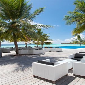 Vilamendhoo Island Resort And Spa Luxury Maldives holiday Packages Sunset Bar Pool