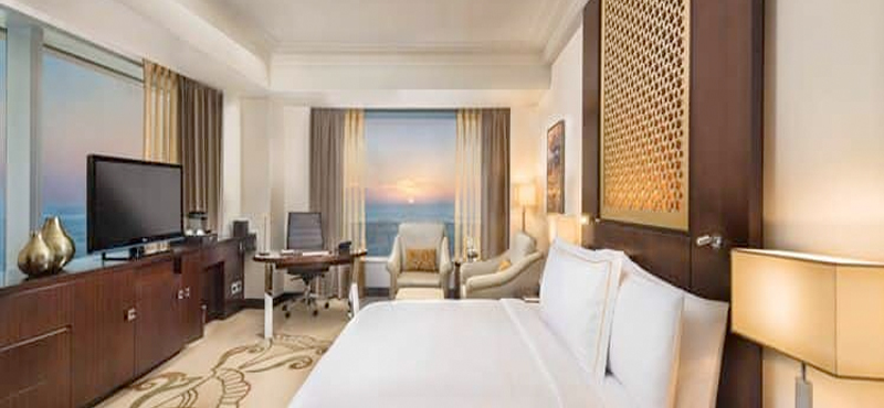 Luxury Dubai Holiday Packages Conrad Dubai King Deluxe Corner Room Panoramic View1