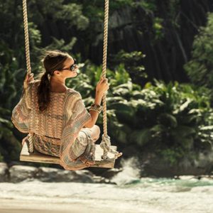 Four Seasons Resort Seychelles Luxury Seychelles holiday Packages Swing On Beach