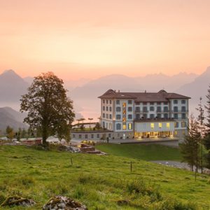 Luxury Switzerland Holiday Packages Hotel Villa Honegg Hotel Exterior At Sunset