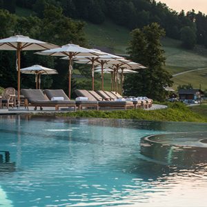 Luxury Switzerland Holiday Packages Hotel Villa Honegg Sun Loungers By The Pool