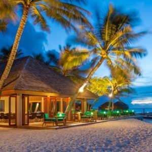Veligandu Island Resort & Spa Luxury Maldives Holiday Packages Athiri Bar Exterior At Evening