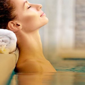 Luxury Spain Holiday Packages Secrets Mallorca Villamil Resort & Spa Women Relaxing In Spa Pool