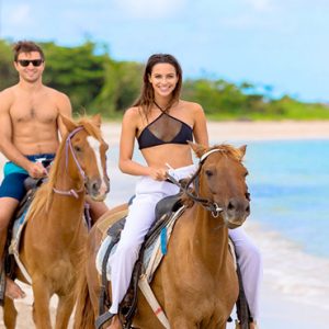 Beach Weddings Abroad St Lucia Weddings Couple Horse Riding On Beach