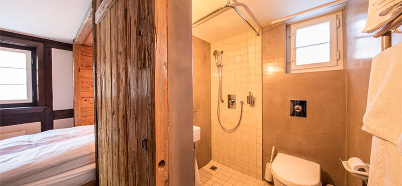 Luxury Switzerland Holiday Packages Guarda Val Cuddle Room Bathroom